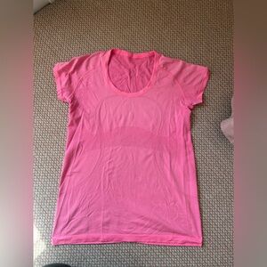 LULULEMON Neon Pink Short Sleeve Swiftly Top, good worn condition, size 12